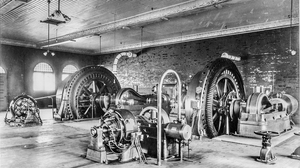 1904 steam engine driven exciter in foreground with two horizontal engines in behind